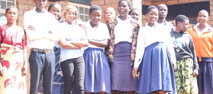 Some of the nursary beneficiaries from from Masambanjati Day Secondary School, with prents and CCDO staff UNDER EDUCATION